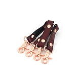 Wine Red leather hogtie with rose gold clips for bondage play, featuring high-quality leather straps and quick-release clips, part of the luxurious Wine Red bondage collection.