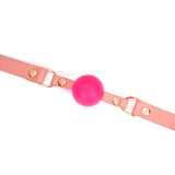 Pink silicone ball gag with rose gold hardware from Pink Dream collection, designed for elegant and feminine bondage play