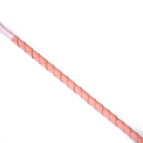 Close-up of pink leather braided handle of the Pink Dream riding crop, ideal for BDSM impact play
