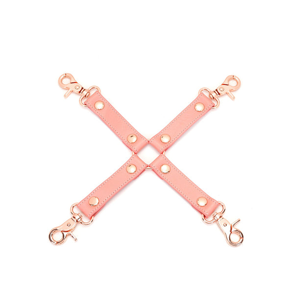 Pink Dream: premium pink leather hogtie with rose gold hardware and quick-release clips for bondage play, part of the Pink Dream collection.