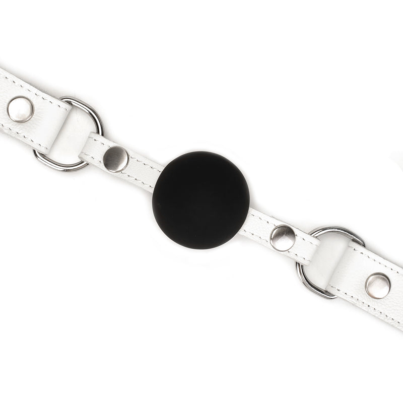 Fuji White silicone ball gag with white leather straps and silver metal hardware for BDSM restraint play, showing adjustable features and quality design