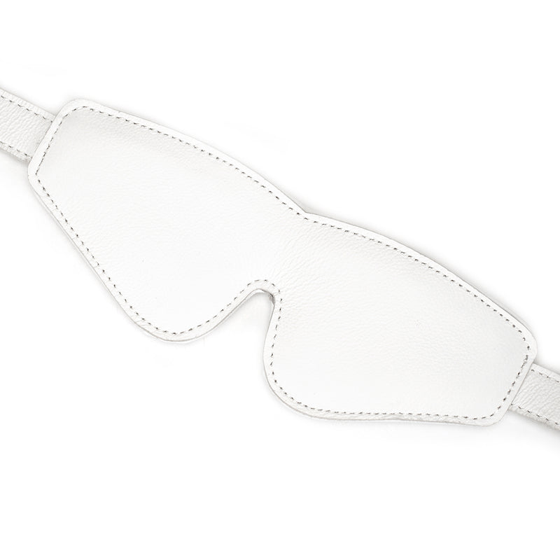 White leather padded blindfold from Fuji White collection, featuring adjustable strap and detailed stitching for sensory play in BDSM