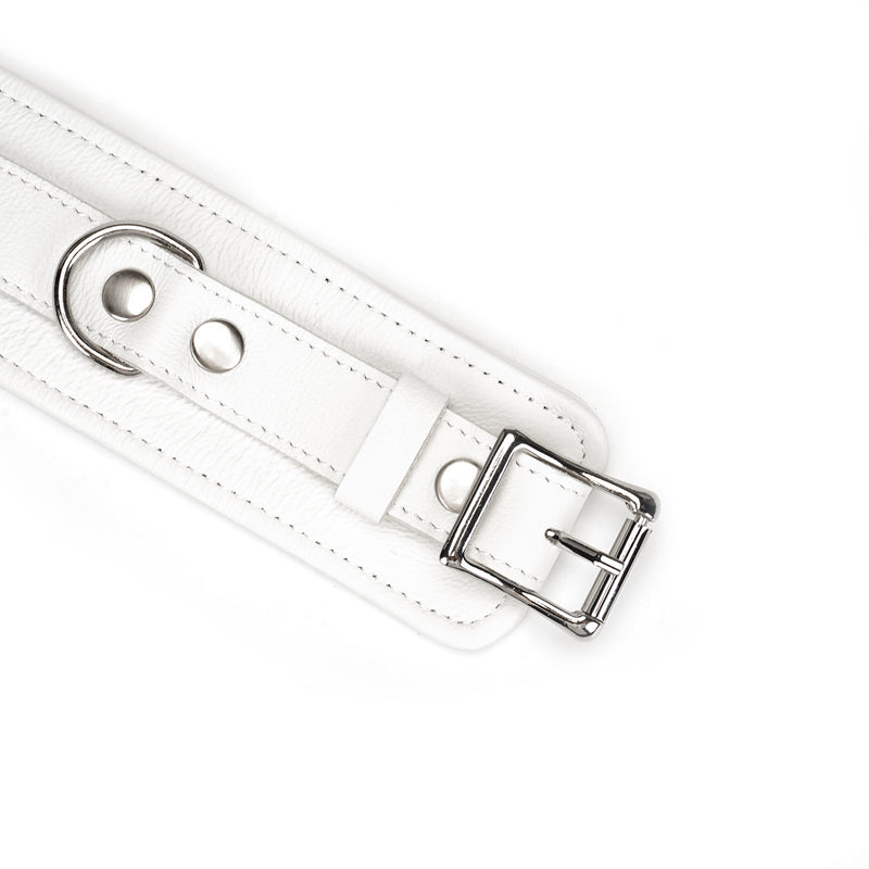 White leather ankle cuffs with silver buckle for bondage play, adjustable and designed for safety and comfort, part of the Fuji White BDSM collection
