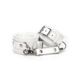 Fuji White leather ankle cuffs with silver metal hardware, featuring adjustable buckles and quick-release clips for safe and stylish bondage play