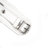 Close-up of Fuji White Leather Handcuffs featuring silver metal hardware and detailed white leather strap, designed for bondage play and wrist restraint