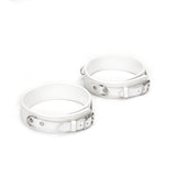 Fuji White leather thigh cuffs with silver metal hardware, adjustable straps, and D-rings for BDSM play