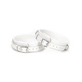 Fuji White leather thigh cuffs with silver hardware for BDSM restraint play, adjustable and durable