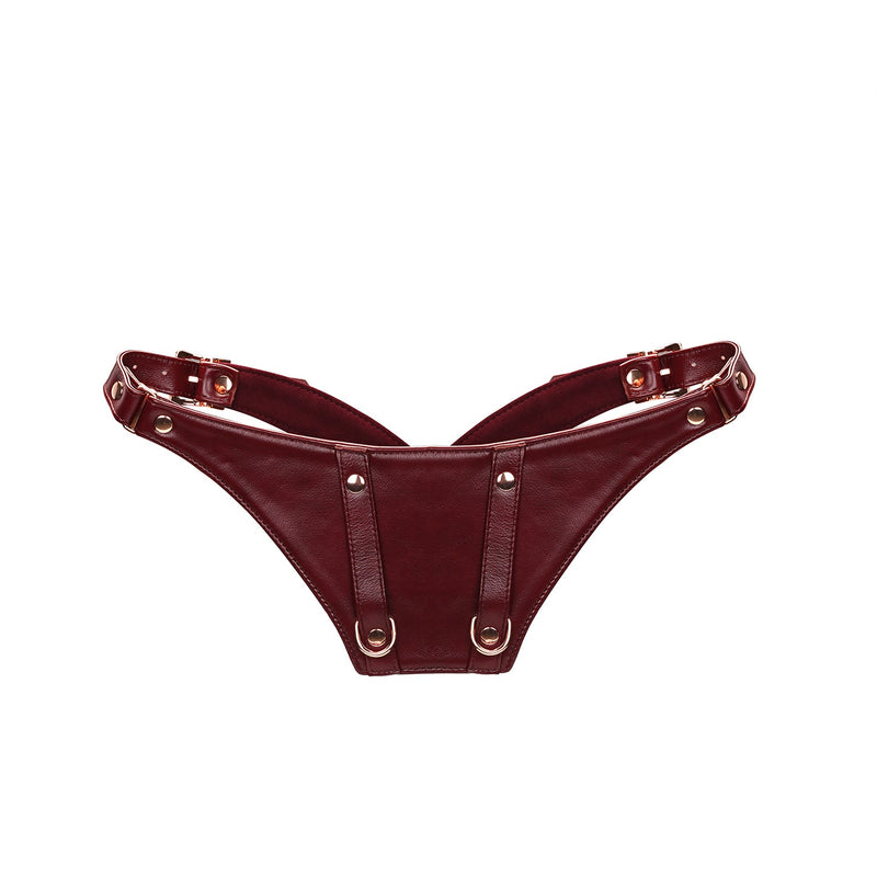 Luxury wine red leather 'Forced Orgasm' wand massager harness belt with rose gold hardware, part of the BDSM play equipment for indulgent erotic experiences.