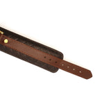 Luxury leather ankle cuffs with detailed stitching and vintage gold buckle holes from The Equestrian collection