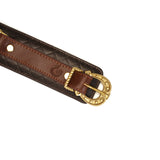 Close-up of The Equestrian luxury leather ankle cuff with vintage gold buckle and detailed stitching