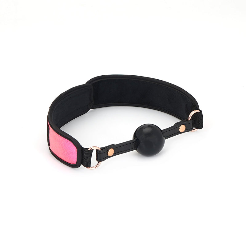 Glossy pink and black ball gag with rose gold hardware from the Vivid Sakura Soft Bondage Kit
