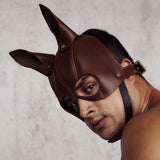 Man wearing The Equestrian luxury leather bondage mask for BDSM roleplay from LIEBE SEELE's collection