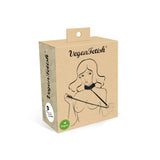 Vegan Fetish product packaging featuring a woman in bondage, marked with vegan certification