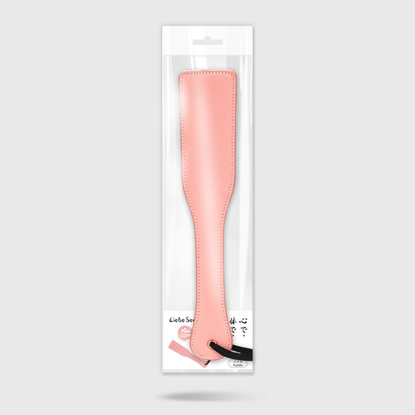 Pink Dream leather spanking paddle by LIEBE SEELE in retail packaging, featuring stitched edges and premium design for impact play