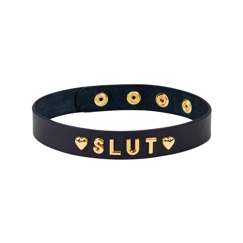 Black leather Gold Word Choker embossed with the word 'SLUT' in gold letters, flanked by heart shapes, with adjustable size options