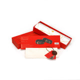 LIEBE SEELE The Equestrian leather thigh cuffs set in red packaging with vintage gold hardware on display, ideal for luxury bondage play