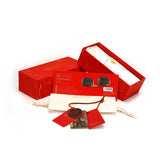 The Equestrian collection leather handcuffs in premium red packaging with vintage gold hardware, showcasing high-end bondage handcuffs product by LIEBE SEELE