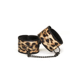 Leopard print wrist cuffs from the Vivid Hyō Soft Bondage Kit, ideal for beginner's bondage exploration