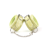 Electric yellow beginner's bondage handcuffs in faux crocodile leather with silver chain and adjustable buckles