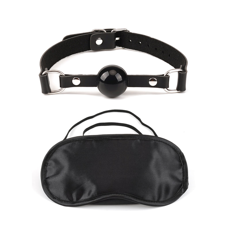 Adjustable black ball gag with breathable hole and satin blindfold from Bound You essentials beginner's bondage kit.