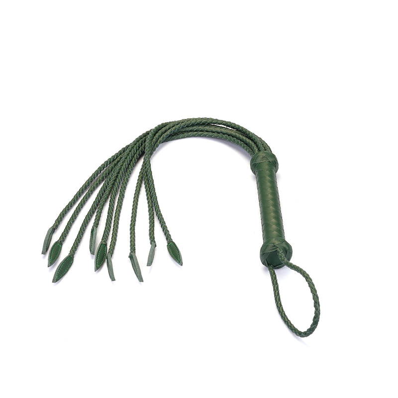 Mossy Chic green leather cat o' nine tails whip with braided handle for BDSM play, featuring high-quality leather and rose gold metal accents