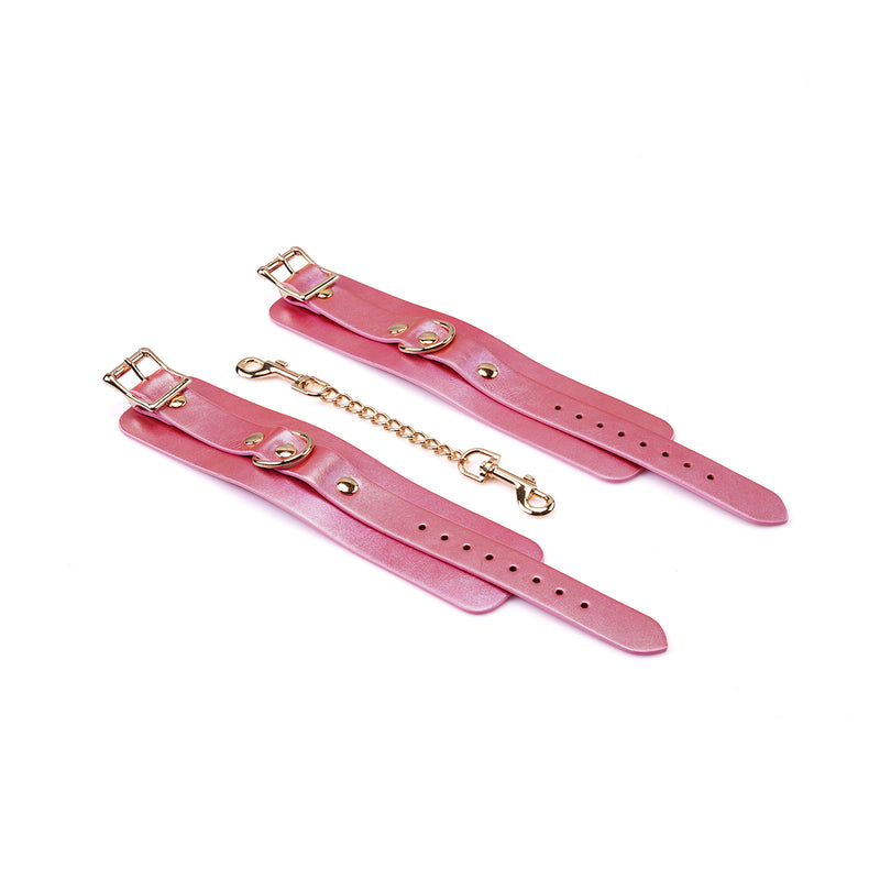 Lustre Rosa: Pink Leather Wrist Cuffs with Gold Hardware