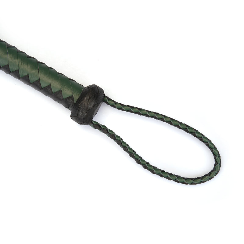 Mossy Chic leather cat o' nine tails whip with green and black braided handle and wrist loop for bondage play