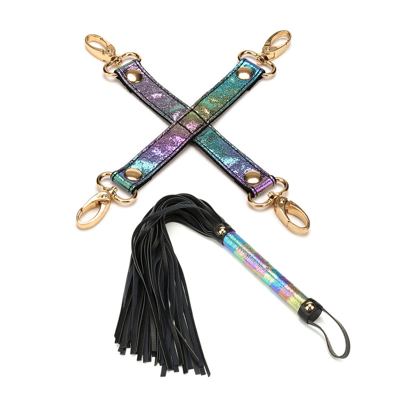 Vivid Niji multicolored soft bondage kit showing holographic rainbow hogtie and black leather flogger with rose gold accents