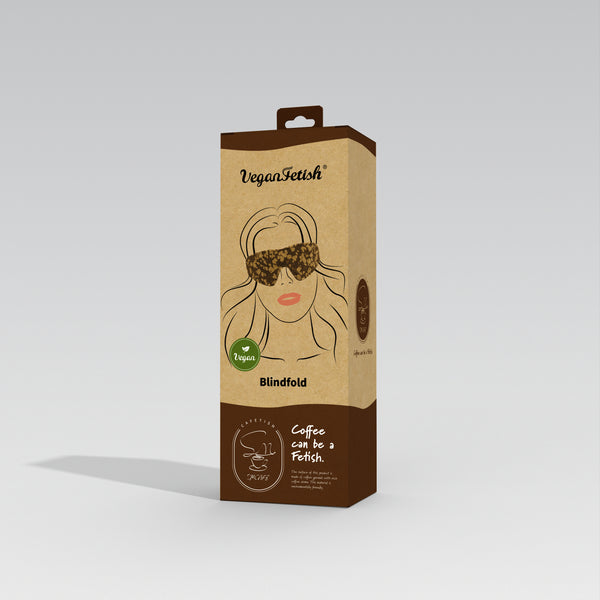 Vegan Fetish SM Cafe Blindfold packaging featuring a woman's face with a blindfold, highlighted with sustainable design elements like coffee grounds and cork