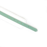 Close-up of mint green and white leather handcuff strap with gold hardware details from Liebe Seele's Fairy collection