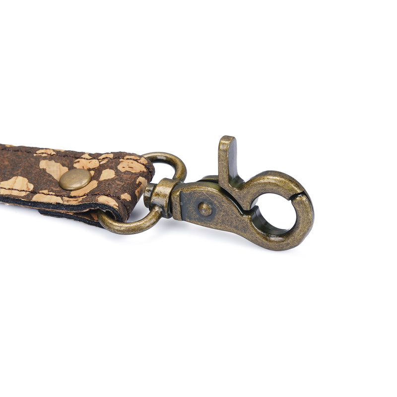 Antique bronze metal clip attached to eco-friendly cork and coffee ground strap for Vegan Fetish SM Cafe Hogtie