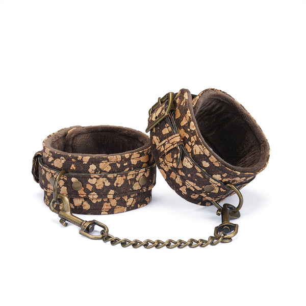 Eco-friendly SM Cafe handcuffs crafted from coffee grounds and cork with plush velvet lining and antique bronze hardware