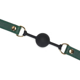 Mossy Chic silicone ball gag with leather straps and gold metal buckles for BDSM play