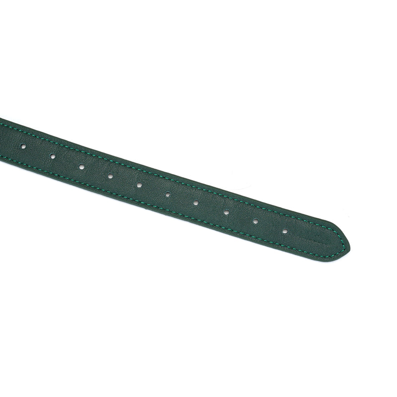 Mossy Chic green leather strap for silicone ball gag with white dot detailing and metal buckle adjustments