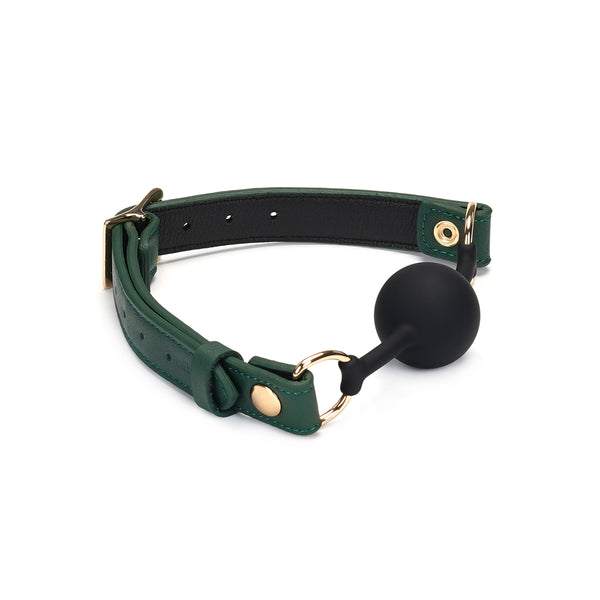 Mossy Chic green leather ball gag with black silicone ball and gold metal adjustable buckle, luxurious BDSM gear