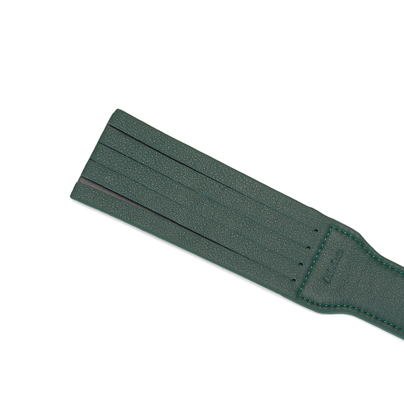 Close-up view of Mossy Chic Dual Sensation Leather Spanking Paddle in dark green, displaying its textured and split-section design for varied impact play