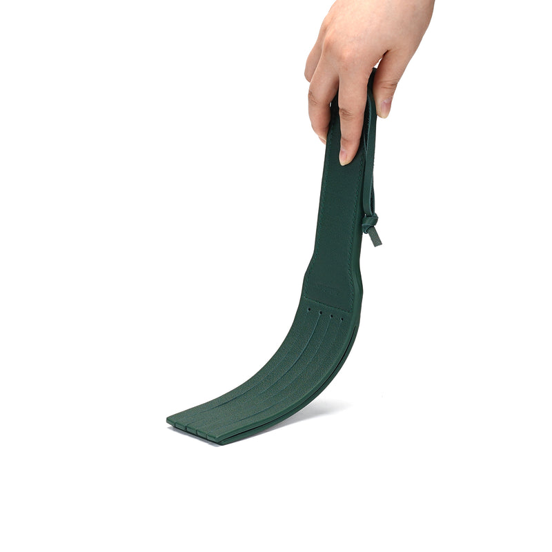 Luxurious Mossy Chic green leather spanking paddle with wrist strap for bondage play