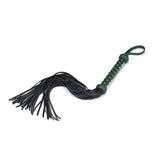 Mossy Chic premium leather flogger with studded green handle and black fronds for BDSM play