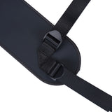 Close-up of black faux leather strap-on harness with adjustable strap for vegan bondage play