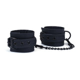 Black faux leather ankle cuffs from Vegan Fetish collection, connected by chain