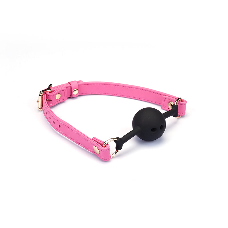 Italian Leather Breathable Ball Gag in Rose Red with adjustable straps and black silicone ball for bondage play