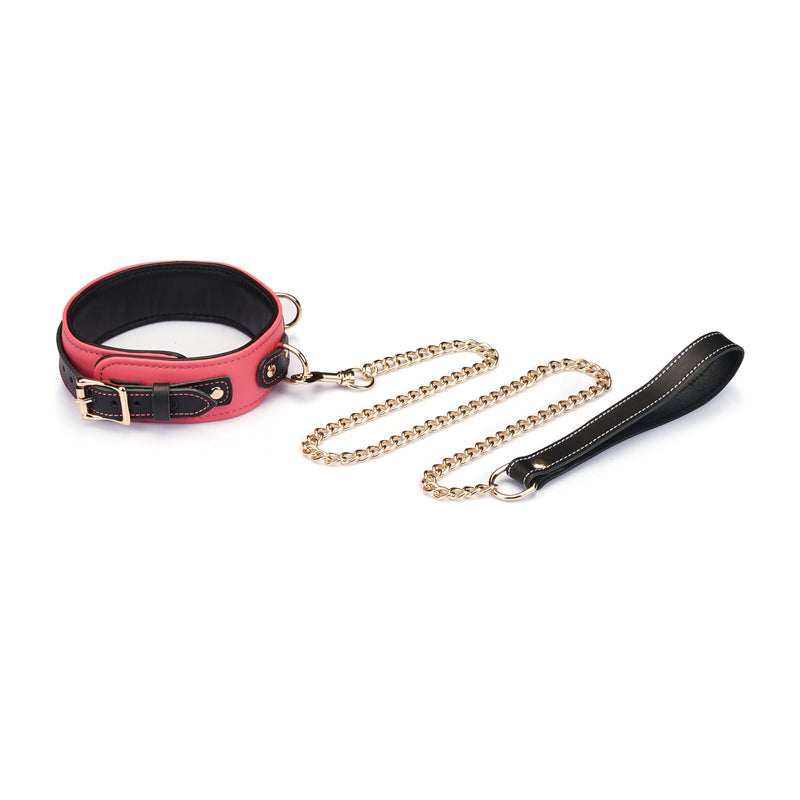 Italian leather collar in red with adjustable buckle and gold-tone chain leash for stylish bondage play