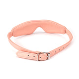 Pink vegan leather blindfold with golden buckle from Dark Candy collection, ideal for sensory deprivation and bondage play