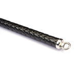Close-up of Japanese Professional Dominatrix Customized Bull Whip handle with black leather texture and silver metal ring