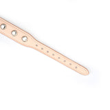 Close-up of Liebe Seele pink premium leather choker with clear gemstones and adjustable holes