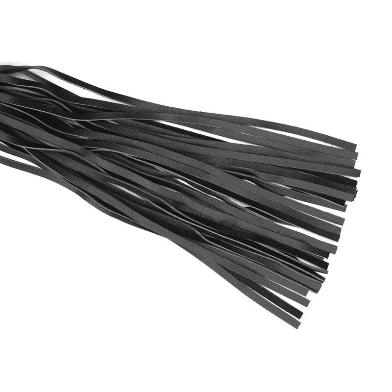 Close-up view of glossy black leather flogger tails for bondage play, highlighting premium leather texture and craftsmanship