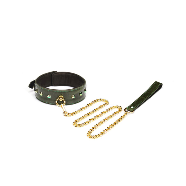 Luxury green leather collar with gemstone O-ring and gold chain leash from LIEBE SEELE, detailed with metal studs and adjustable strap