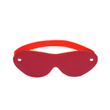 Faux leather red blindfold with detailed stitching and adjustable strap for erotic and sensory play