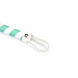 Close-up view of white and green leather flogger handle from Fairy collection, featuring striped design and leather loop