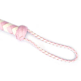 White and pink leather flogger whip with braided handle from the Fairy Leather collection